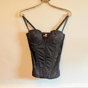 Victoria's Secret black corset top with boning, side zipper, and hot pink bow.